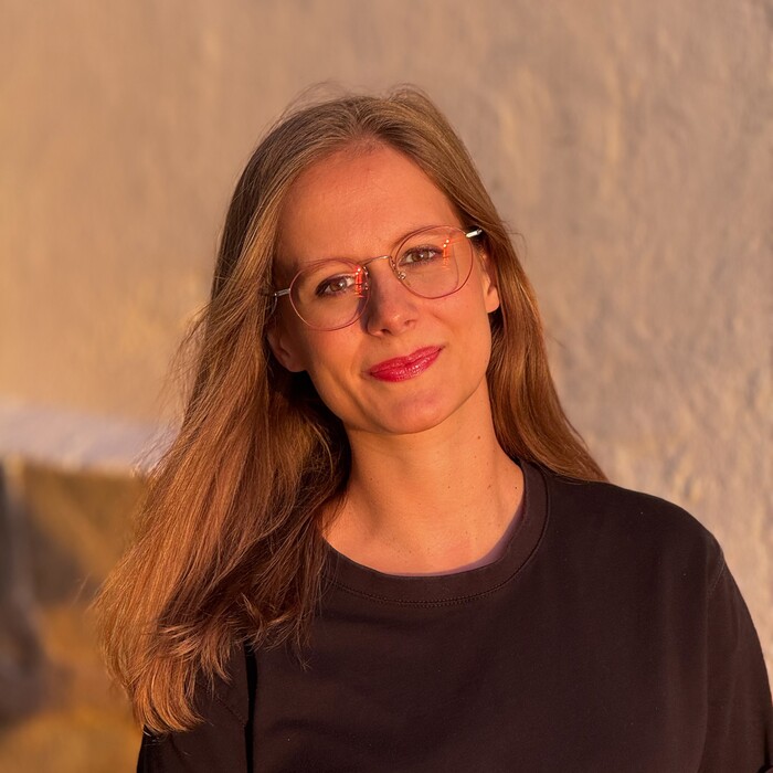 Lächelndes Porträt von Marie Daut für 1:1 Begleitung